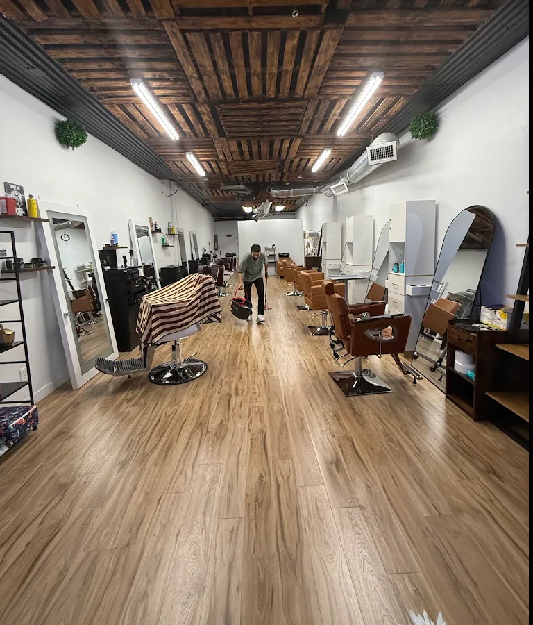 Inside LinkCut — wood ceiling and barber chairs